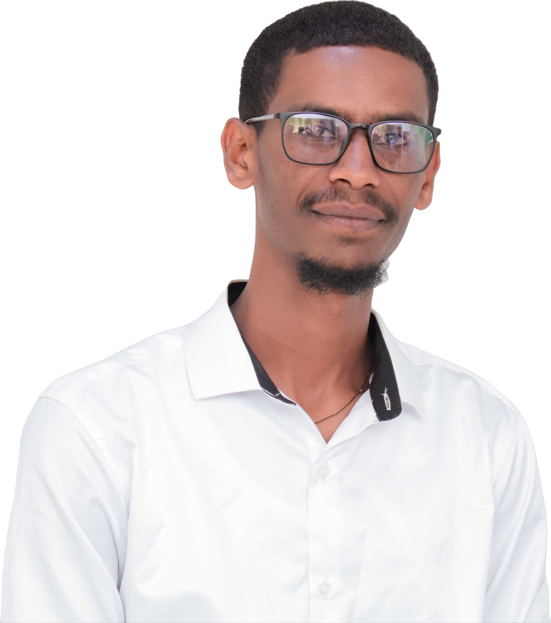 Bereket Zeselassie, smiling, wearing glasses and a white shirt